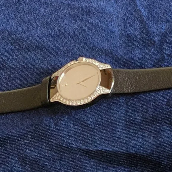 Exquisite, RARE Movado Allia, mirror face with .45 carat diamonds